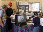 BSA Troop 182, Scout Blast 2001, May 19, 2001; Jacksonville, Florida;
      Railroading Merit Badge sponsored by CSX Transporation and BSA Troop 182. 
      Avis Adkins discusses model railroading with some of the attending scouts.